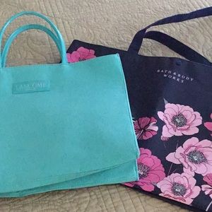 Two new totes: Lancôme and Bath and Body Works. NWOT. Nonsmoking home.